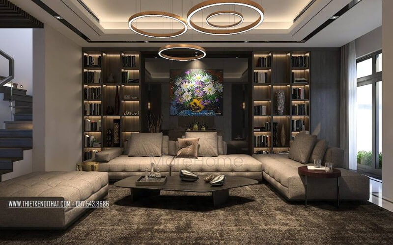Bố trí nội thất phòng khách hiện đại, đẹp với bộ bàn ghế sofa lớn, kệ ốp tường, tranh treo tường. Thiết kế phòng khách độc đáo