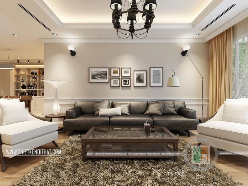 Mẫu thiết kế nội thất phòng khách đẹp cho chung cư với bộ sofa da cao cấp màu đèn, trắng tạo điểm nhấn nổi bật cho căn phòng. Thiết kế phòng khách tại Hà Nội