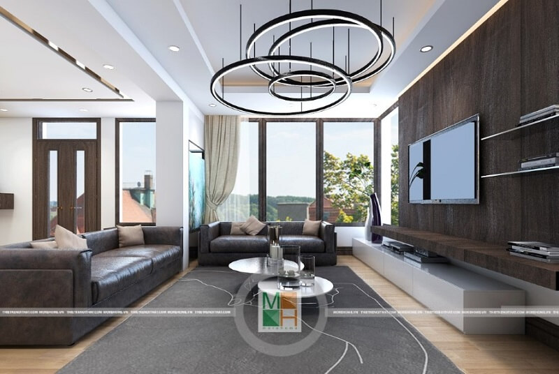 Trang trí nội thất phòng khách chung cư với đồ nội thất sử dụng tông màu veneer trầm mang đến sự trang trọng và hiện đại cho không gian nội thất. Tổng hợp các mẫu trang trí phòng khách đẹp mê ly
